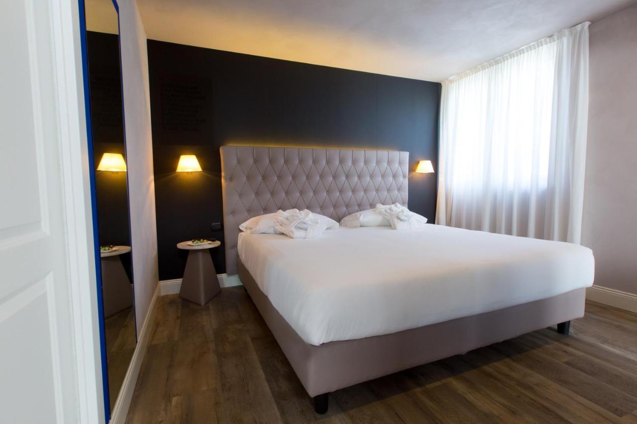 Hotel Al Campanile - Luxury Suites & Apartments Baveno Exterior photo
