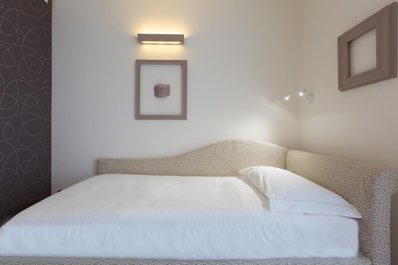 Hotel Al Campanile - Luxury Suites & Apartments Baveno Exterior photo